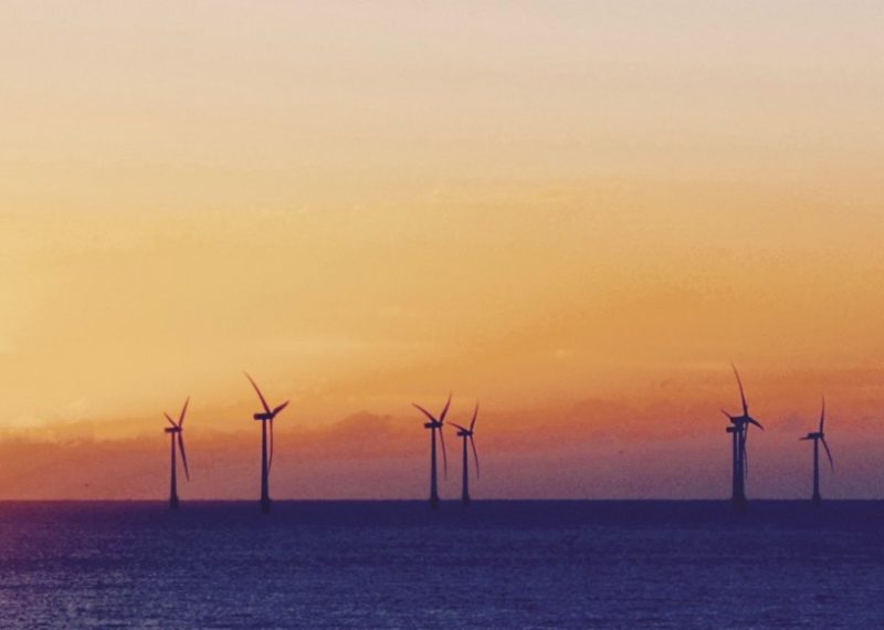 wind turbines at the sunset