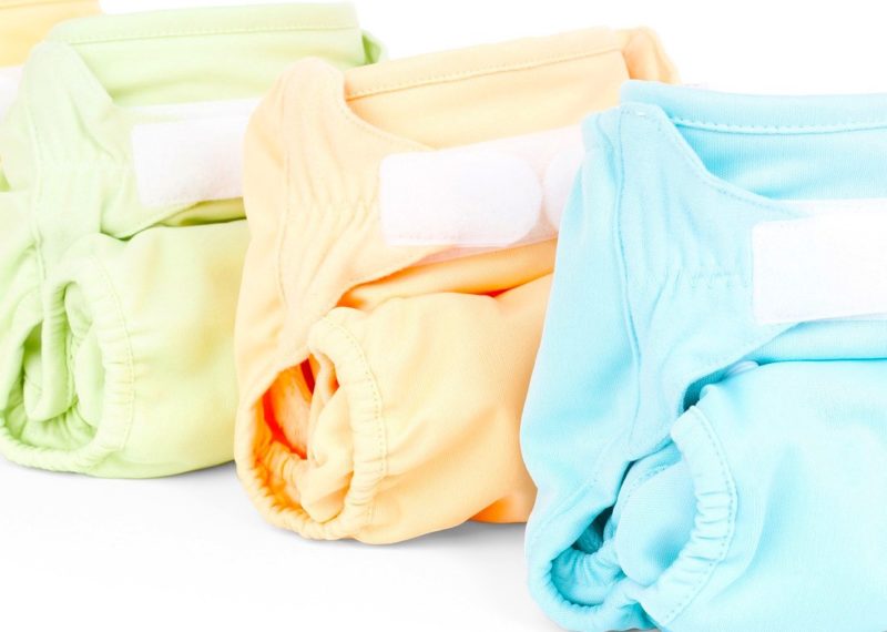 light blue, orange, green and yellow Diapers