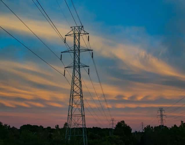 view of grid power lines during sunset
