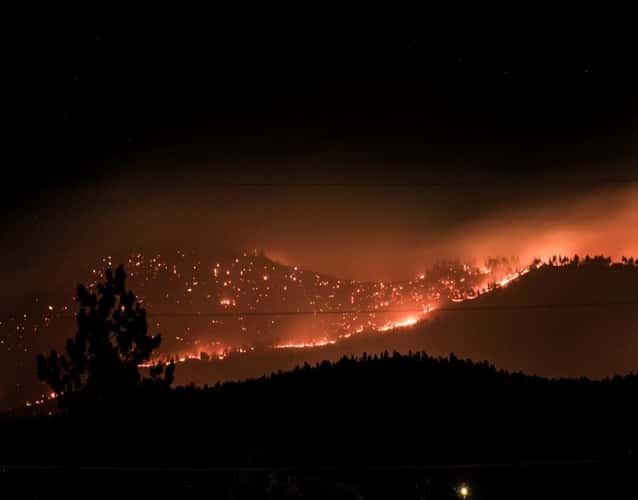 wildfire on hills during the night
