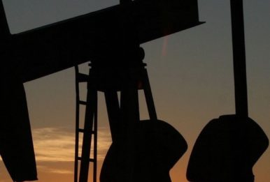 An oil rig at dusk