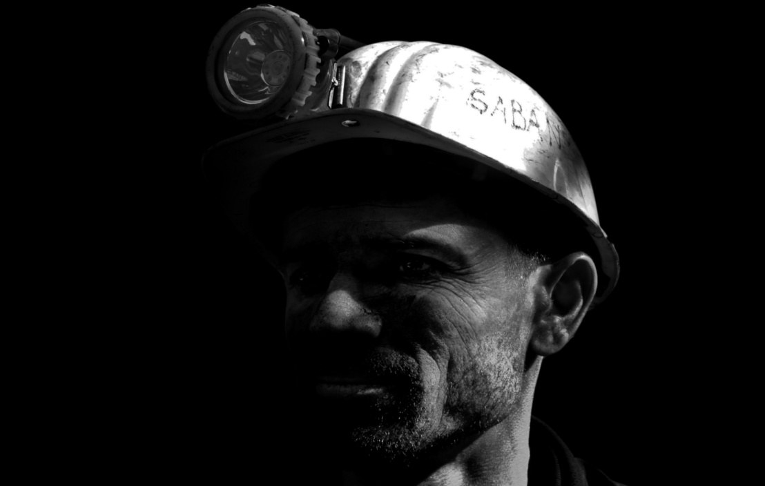 face miner black and white with helmet