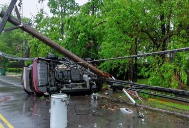 Destruct pole truck fell over a car