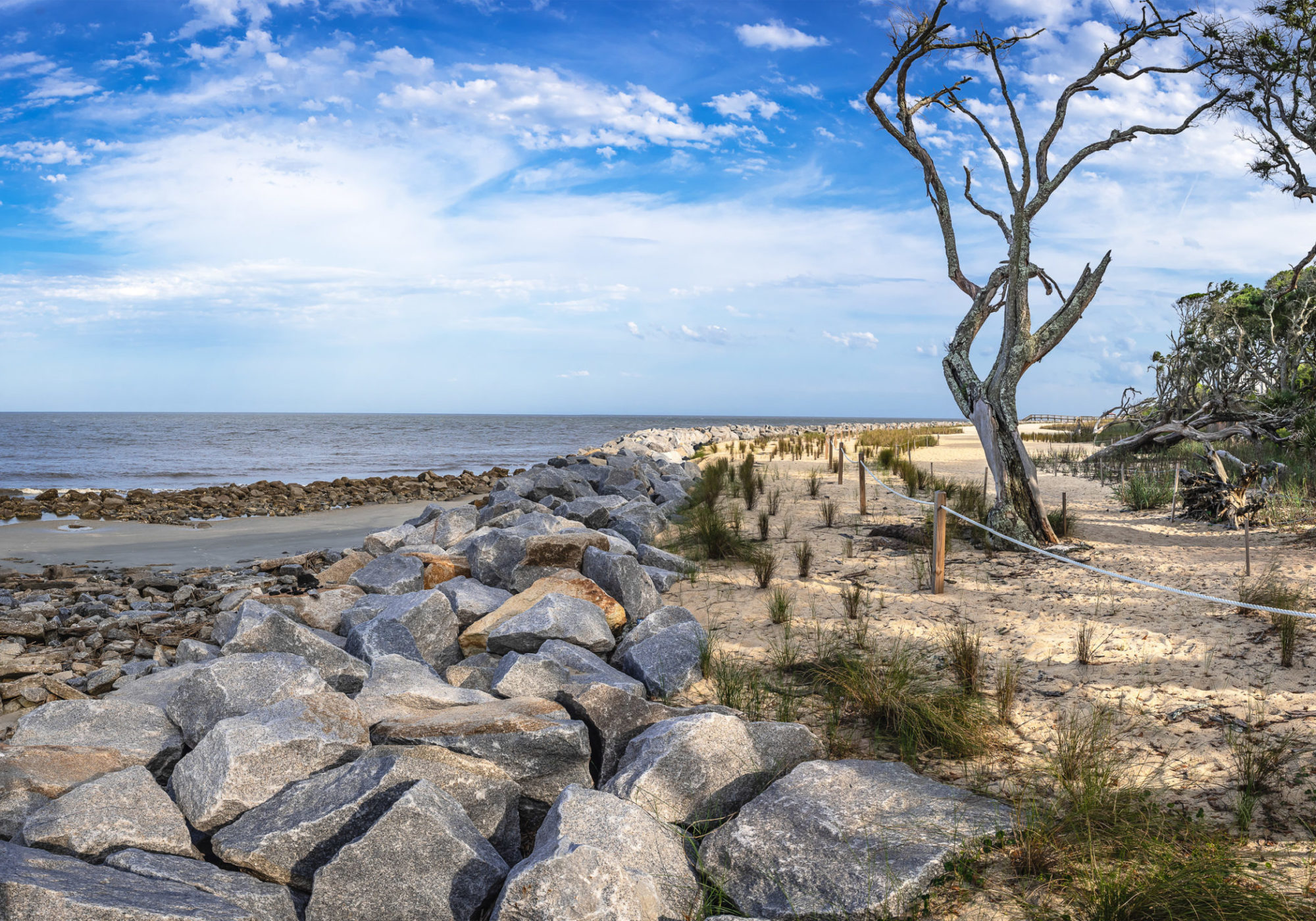 Officials have erected a small, rocky seawall to preserve this beach, just south of Driftwood beach, and on the northeastern side Jekyll Island. Credit: Teake Zuidema for Nexus Media News