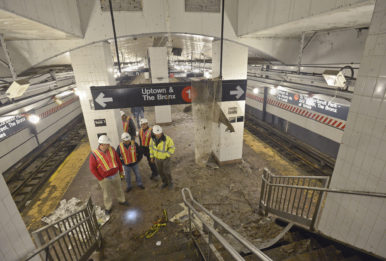 Workers examine damage to New York's South Ferry subway station following Hurricane Sandy's storm surge. Credit: Metropolitan Transportation Authority / Patrick Cashin via Flickr