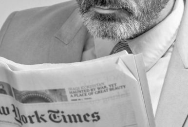 A man reading The New York Times. Source: Pexels