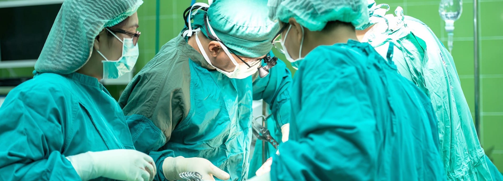 Surgeons performing an operation