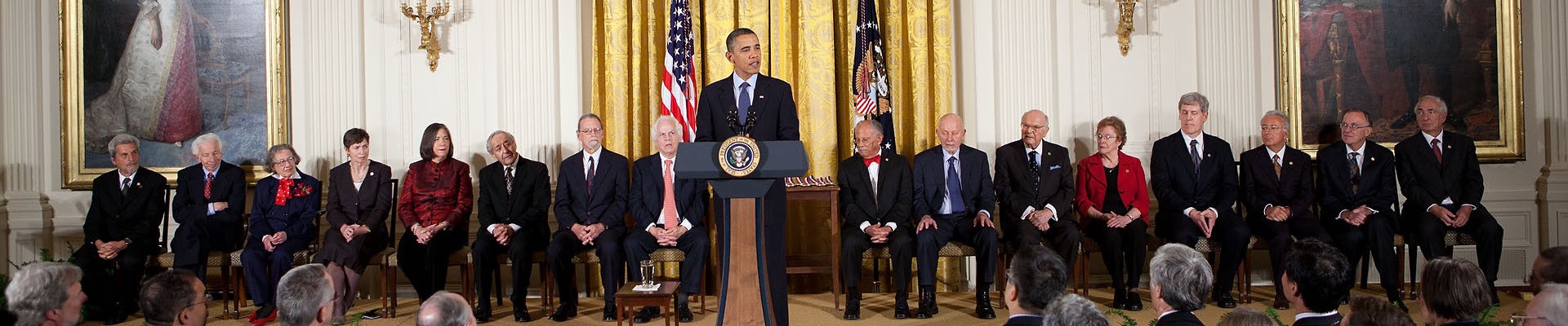 President Barack Obama speaks at the National Medal of Technology and Innovation awards, November 17, 2010. National Medal of Science recipient Warren Washington sits to his left.